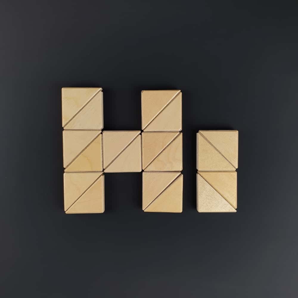 Wooden logic puzzle - small parade of triangles